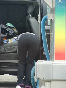 Girls cleaning their cars in jeans and pants