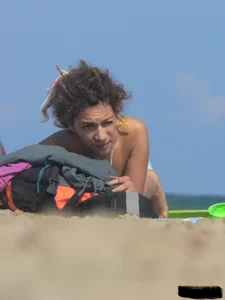 Sexy girls going topless at the beach showing off their sexy bodies