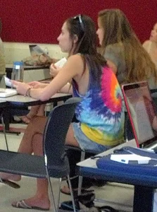 College girl in class showing sideboob with no bra on