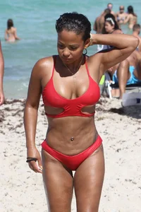 Christina Milian in red bikini in Miami with hard nipples
