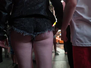 Girl in NYC showing her ass cheeks in denim shorts