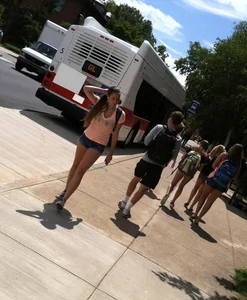 Hot college girl in little jean shorts showing some cheeks and legs