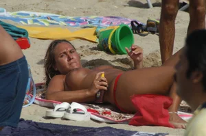 Topless girls on a beach in Barcelona