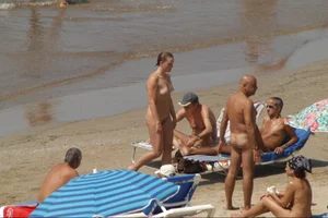 Girls on a nude beach in Sitges, Spain