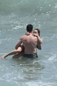 Hilary Duff in purple bikini in Malibu with a great ass and hard nipples