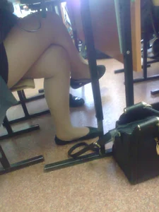 Crossed Legs in Pantyhose And Flats Under Desk Creepshot