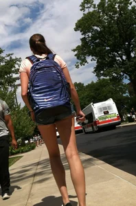 Hot college girl in little jean shorts showing some cheeks and legs