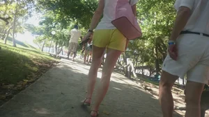 Milf in yellow shorts with vpl and a wedgie