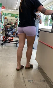 in purple Lycra shorts…