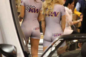 Car show models in spandex short suits with cleavage and camel toe