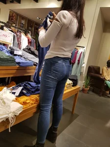 Sexy clothing store employee with a nice ass in tight jeans