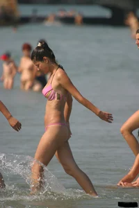 Sexy candid topless and nude beach girls