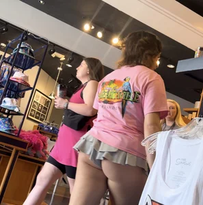 Petite light skin Latina with ass hanging out of skirty shorts