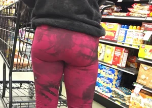 Milf grocery shopping in red leggings with a great ass
