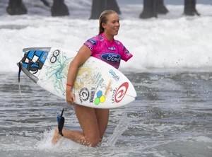 Candid surfer babes on the beach and in bikinis