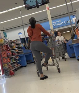 Ebony chick orange sweater + grey leggings