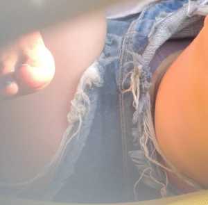 An Awesome Gallery of Creepshots of a Girl in Fringed Mini Shorts, Closeup of Her Panties With Parts of Her Pussy Flashing