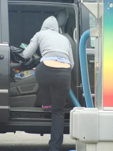 Girls cleaning their cars in jeans and pants