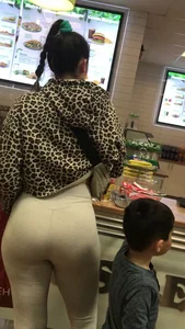 Brunette babe with a great ass in tight grey leggings