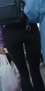 Juicy ass in black tight jeans and nice skinny legs street closeups