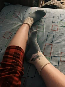 Feet in Socks Bed Selfie