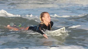 Hot surfer chicks out in the water