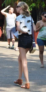 Skinny blonde chick in little denim shorts