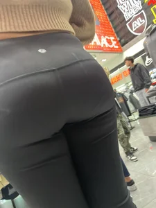 latina with a nice butt in leggings capped in mall