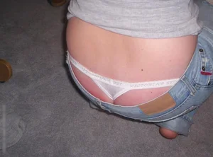 Bunch of girls with their thongs hanging out