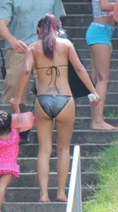Sexy brunette milf in a bikini with a great body, nice ass and some camel toe