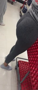 Nice shaped brunette in leggings