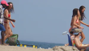 3 sexy girls on the beach in bikinis