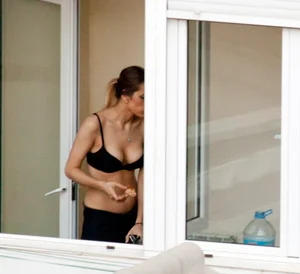 Hot neighbor on the patio in her bra with nice tits