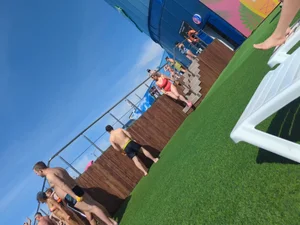 Large collection of hot beach girls lying on the beach and bending over