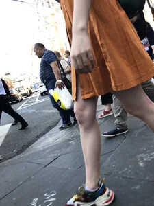 Cute Teen Girl in a Dress With Slim Legs Standing in the Subway Train, Then Crossing the Street Photo Gallery