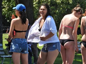 Group of sexy girls in bikinis at the beach