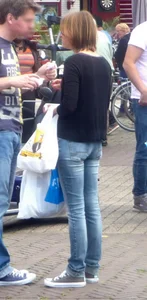 Girls in tight blue jeans on the street creepshots