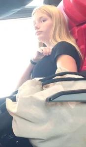 Hot busty blonde on train