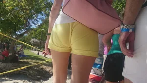 Milf in yellow shorts with vpl and a wedgie