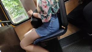 Girl with Hot Legs Dressed in Sandals, Denim Skirt and Flowery Blouse Sitting in a Public Bus Candid
