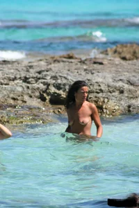 Nude beach ladies in the water showing their tits