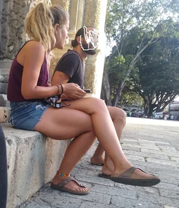 Short, thick crossed legs