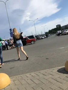 Nice candid girl in a jean skirt with hot legs