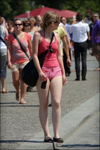 Girl showing serious ass cheeks and great ass in tiny pink shorts
