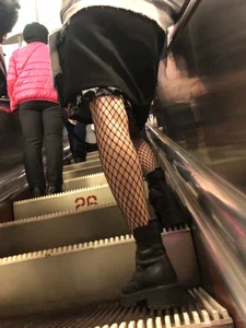 Fishnet Pantyhose on the Subway Escalator Creepshot