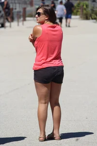 Thick girl in pink top and black shorts with vpl