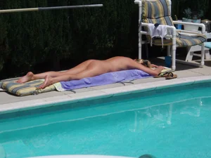 Naked Girl Lying by the Swimming Pool Candid Photo