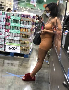 Latina with hard nipples and a big booty in tight spandex shorts outfit