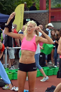 Sexy blonde track sprinter changing after a race