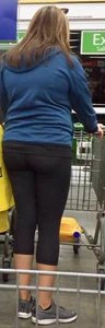 Walmart milf in line with a nice ass in leggings
